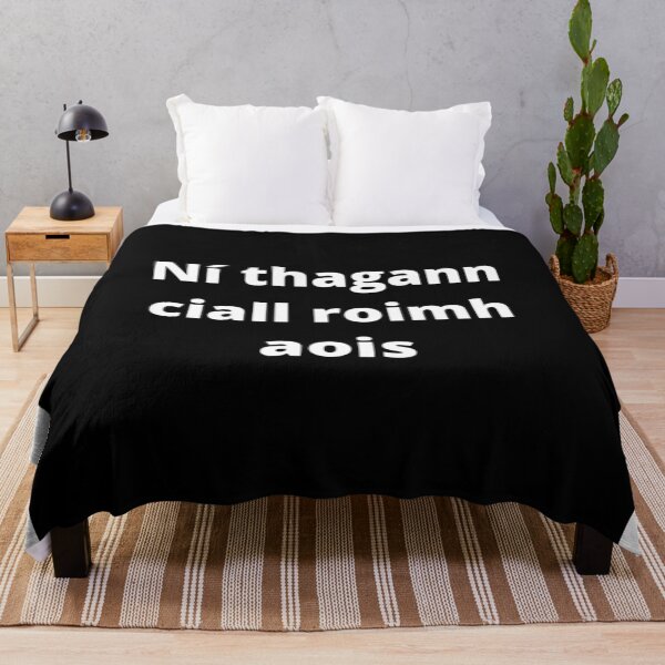 Item preview, Ní thagann ciall roimh aois (Wisdom does not come before age) - Minimalist Black & White Text Design designed and sold by fishpressink.