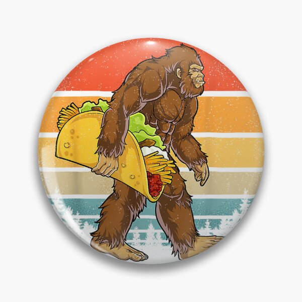 Item preview, Bigfoot Carrying Taco Funny Cinco de Mayo Boys Men Sasquatch T-Shirt designed and sold by Julian Segers.