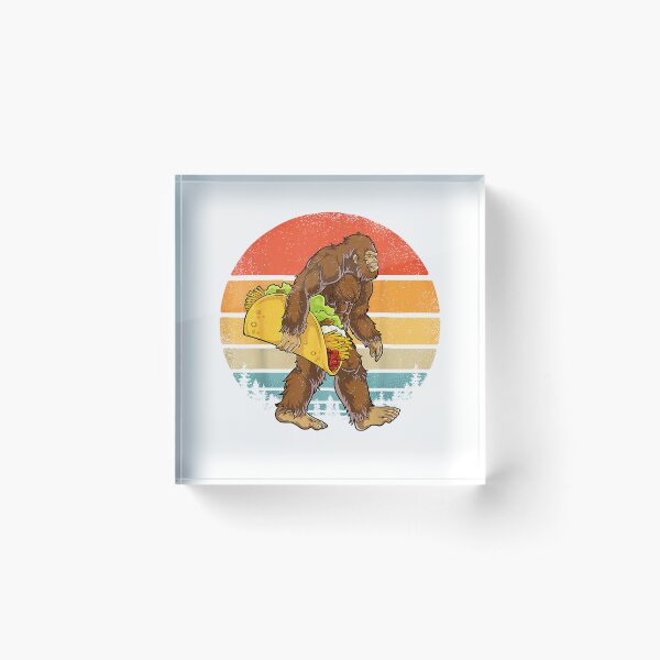 Item preview, Bigfoot Carrying Taco Funny Cinco de Mayo Boys Men Sasquatch T-Shirt designed and sold by Julian Segers.