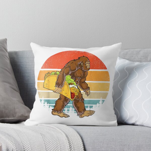 Item preview, Bigfoot Carrying Taco Funny Cinco de Mayo Boys Men Sasquatch T-Shirt designed and sold by Julian Segers.