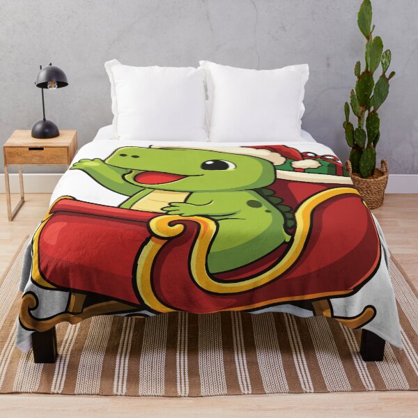 Item preview, Cute cartoon illustration of a dinosaur riding a red Christmas sled designed and sold by merona-design.