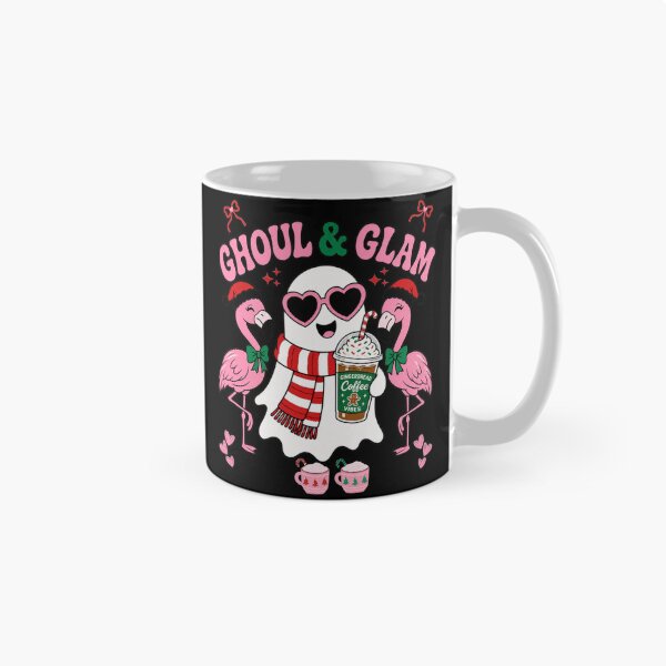 Item preview, Ghoul And Glam Funny Christmas Ghost Flamingo Graphic Tee designed and sold by Design Vibras.
