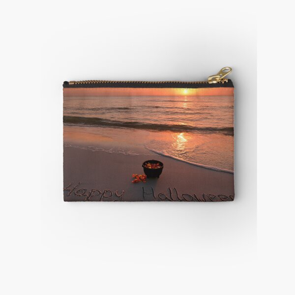 Item preview, Happy Halloween Sand Inscription With Candy Cauldron At Sunset Shoreline designed and sold by chase-thewave.