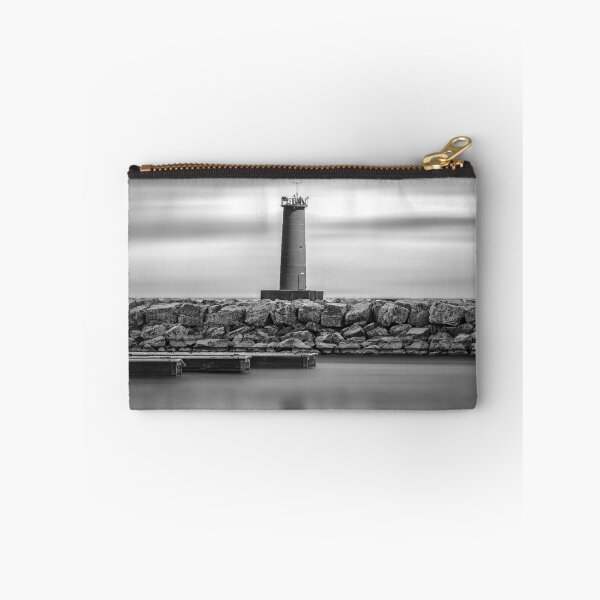 Item preview, sunrise and lighthouse behind smooth water in Sheboygan Wisconsin in black and white designed and sold by TerraMediaLLC.