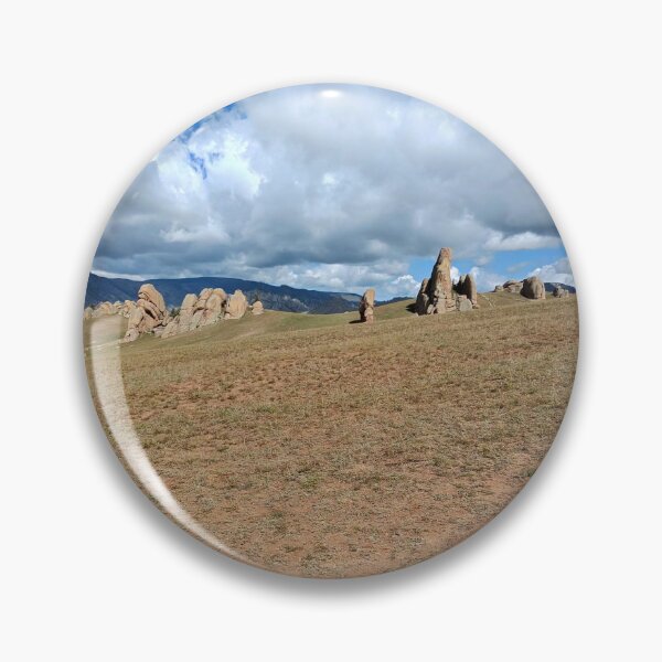 Item preview, Weathered Rock Spires Across Open Mountain Grassland designed and sold by seunghus.
