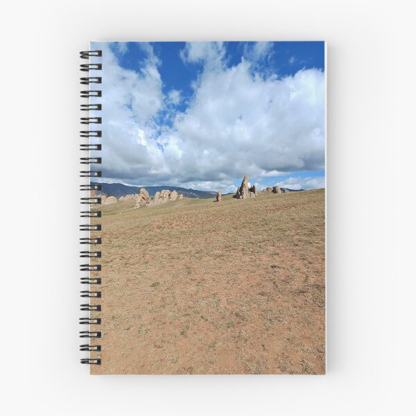 Item preview, Weathered Rock Spires Across Open Mountain Grassland designed and sold by seunghus.