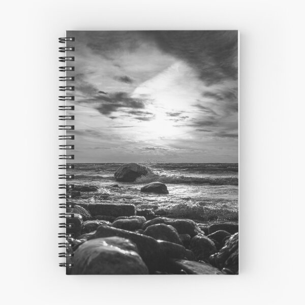 Item preview, sunrise over rocky shore of Lake Michigan in Sheboygan Wisconsin black and white designed and sold by TerraMediaLLC.