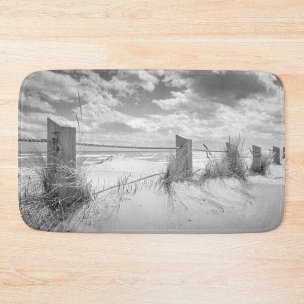 Item preview, Wooden poles and rope fence on beach on Lake Michigan in black and white designed and sold by TerraMediaLLC.