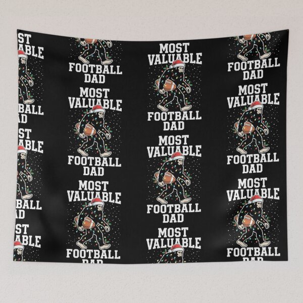 Item preview, Most Valuable Football Dad Bigfoot Christmas Sasquatch Santa Hat Sports Holiday Design designed and sold by 519xdesign.