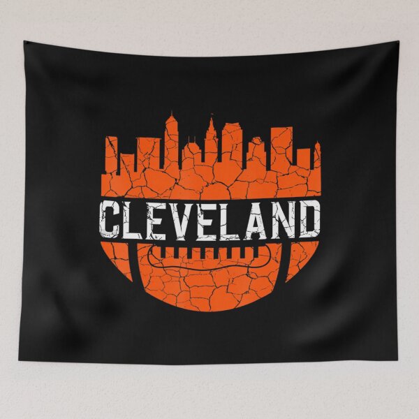 Aperçu de l'œuvre Football américain avec la skyline de Cleveland, Ohio, dans le centre-ville créée et vendue par Artsy Pies.