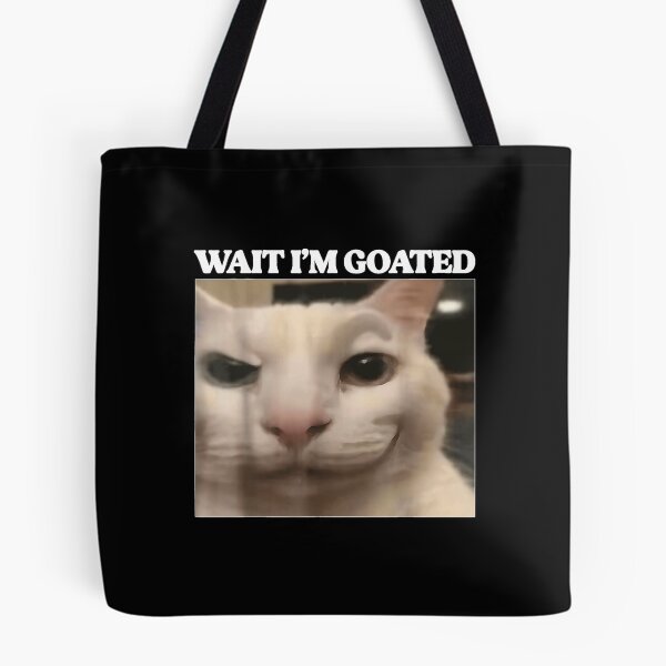 Item preview, Wait I'm Goated Cat Funny Silly Cat Staring Cat Funny Meme  designed and sold by NgumohaLanke.