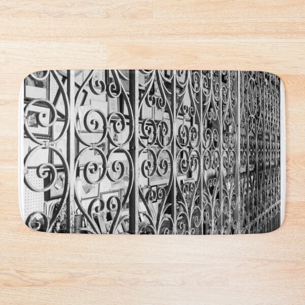 Item preview, Ornate Wrought Iron Gate With Decorative Scrollwork In Front Of Vintage Shop Display designed and sold by Nmallia.