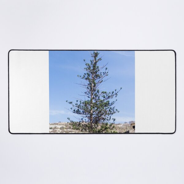 Item preview, Solitary Pine Tree Against Clear Blue Sky Over Rocky Mediterranean Hillside Landscape designed and sold by Nmallia.