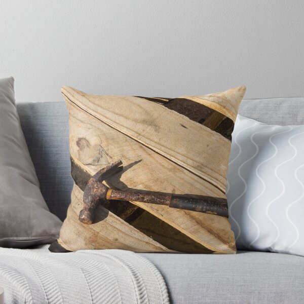 Item preview, Rusty Claw Hammer Lying On Wooden Pallet With Weathered Handle And Sunlit Texture designed and sold by Nmallia.