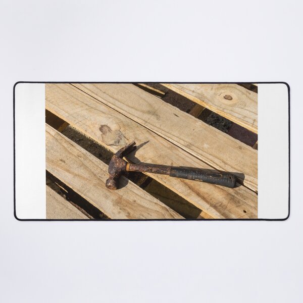 Item preview, Rusty Claw Hammer Lying On Wooden Pallet With Weathered Handle And Sunlit Texture designed and sold by Nmallia.