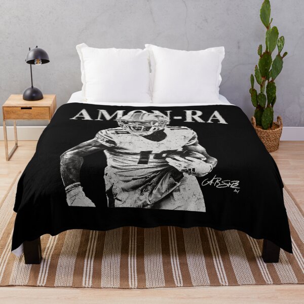 Item preview, AMON-RA St. Brown Football Player Vintage designed and sold by DawnSand162545.