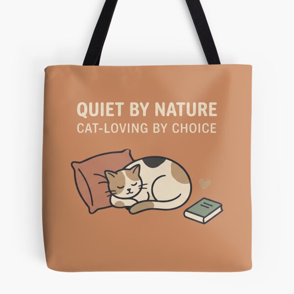 Item preview, A sleeping calico cat with a book and a heart, featuring text about being quiet by nature and cat-loving by choice designed and sold by BiniClicks.