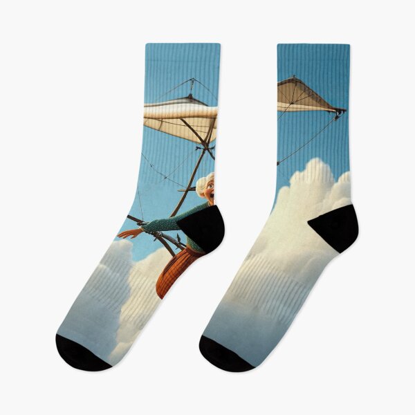 Item preview, Old Fart flying a hang glider designed and sold by Colin Bentham.