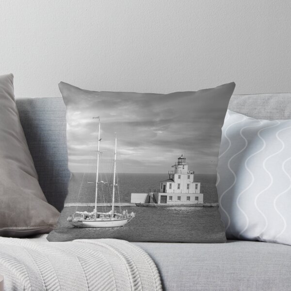 Item preview, Ludington Michigan lighthouse and sailboat in distance black and white designed and sold by TerraMediaLLC.