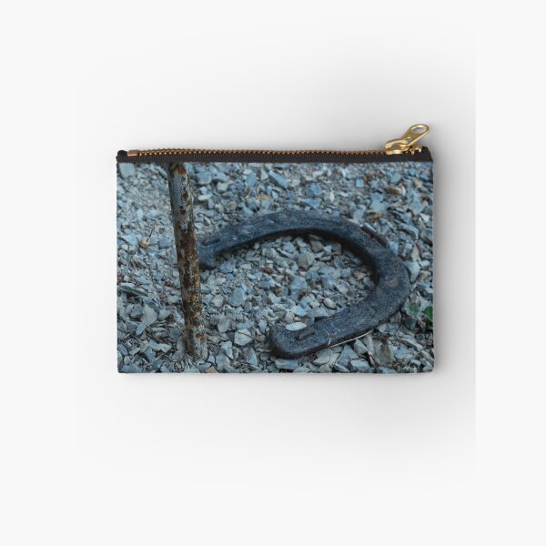 Item preview, Close-up of old horseshoe and rusty peg in gravel designed and sold by lisavonbiela.