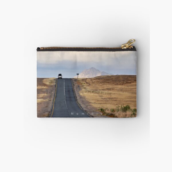 Item preview, Car on a scenic asphalt road in the African desert. Original photography designed and sold by studio838.