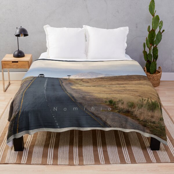 Item preview, Car on a scenic asphalt road in the African desert. Original photography designed and sold by studio838.