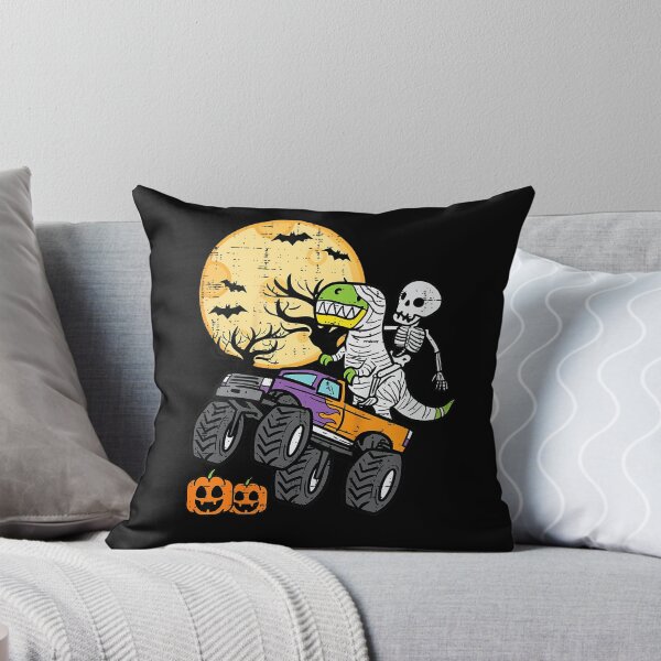Item preview, Skeleton Dinosaur Monster Truck Halloween Spooky Kids Shirt designed and sold by KiblyTees.