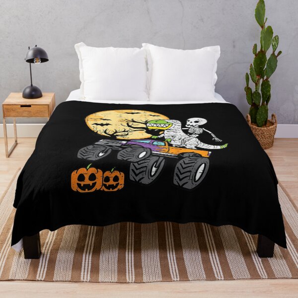 Item preview, Skeleton Dinosaur Monster Truck Halloween Spooky Kids Shirt designed and sold by KiblyTees.