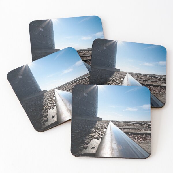 Item preview, Ultrawide and low shot of railroad tracks and grain bin with sunburst designed and sold by lisavonbiela.