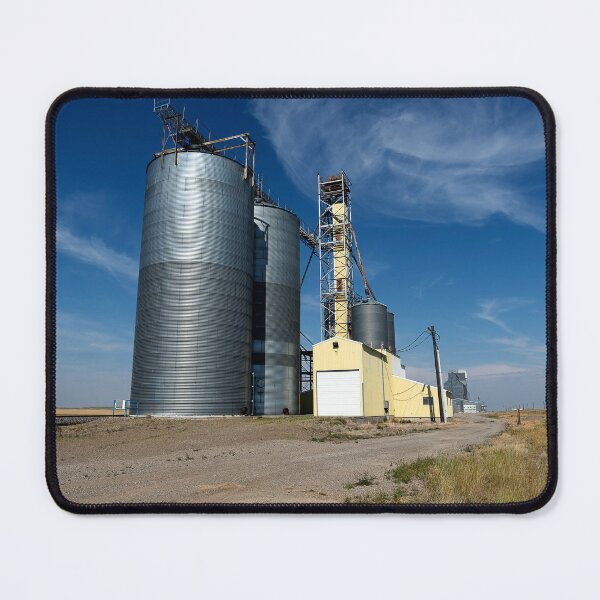 Item preview, Grain elevator scenic against blue sky and distant horizon designed and sold by lisavonbiela.