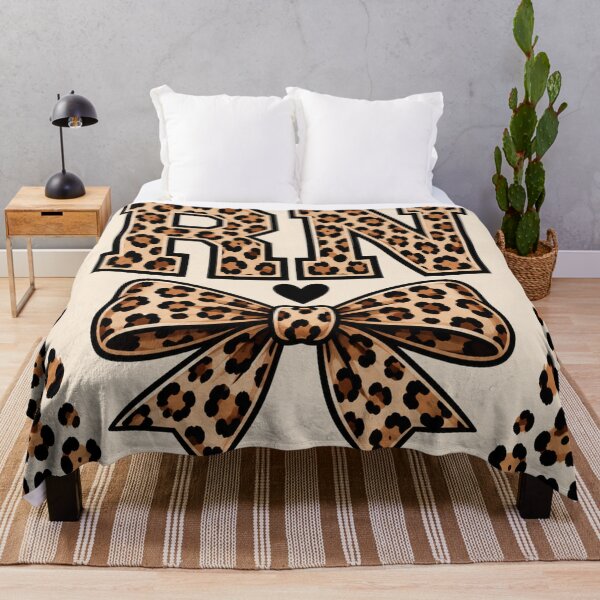 Item preview, Leopard Print RN Registered Nurse Throw Blanket designed and sold by ClinicalHubs.