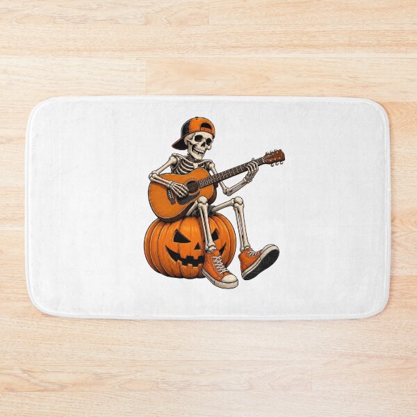 Item preview, Skeleton Sitting on Jack O Lantern Playing the guitar Halloween Cool Graphic designed and sold by OlyvieArt.