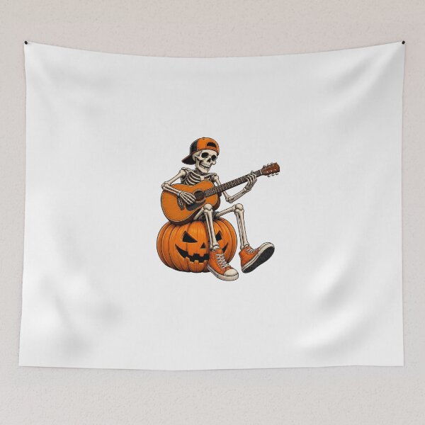 Item preview, Skeleton Sitting on Jack O Lantern Playing the guitar Halloween Cool Graphic designed and sold by OlyvieArt.