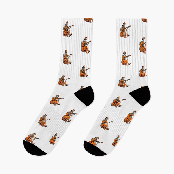 Item preview, Skeleton Sitting on Jack O Lantern Playing the guitar Halloween Cool Graphic designed and sold by OlyvieArt.