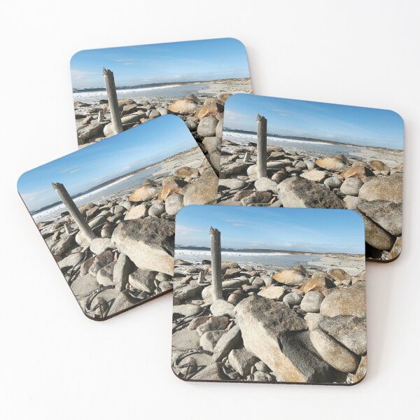 Item preview, Rugged Boulder-Strewn Shoreline With Weathered Post designed and sold by hanlahav.