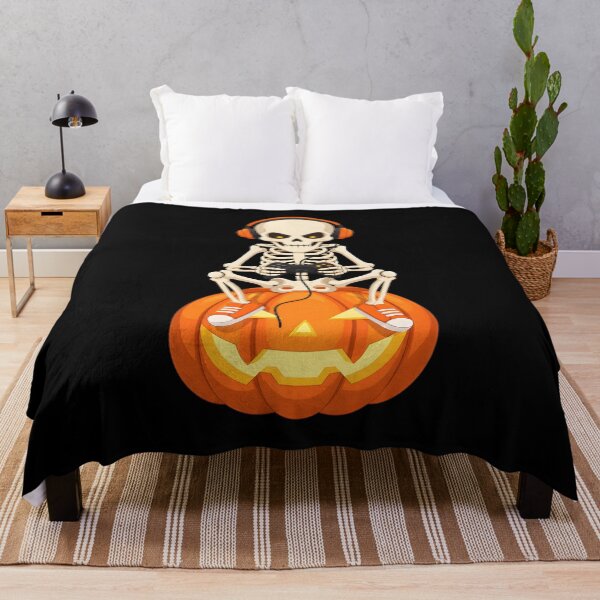 Item preview, Skeleton Gamer Sitting on Pumpkin with Headphones designed and sold by OlyvieArt.