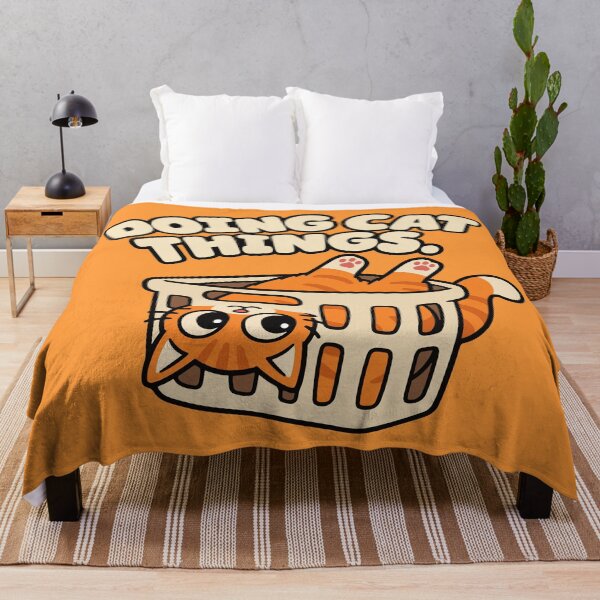 Item preview, Doing Cat Things Funny Orange Cat in Laundry Basket designed and sold by MewMade.