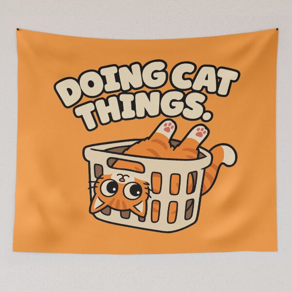 Item preview, Doing Cat Things Funny Orange Cat in Laundry Basket designed and sold by MewMade.