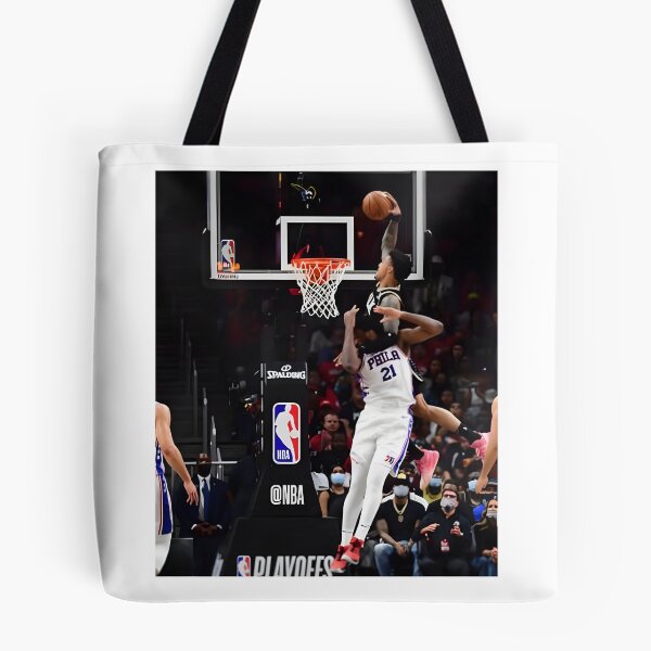 Item preview, John Collins Dunking on Joel Embiid Basketball Artwork designed and sold by Heier.