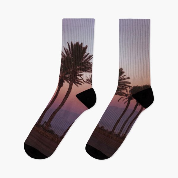 Aperçu de l'œuvre Silhouettes de palmiers au coucher du soleil créée et vendue par assaf.