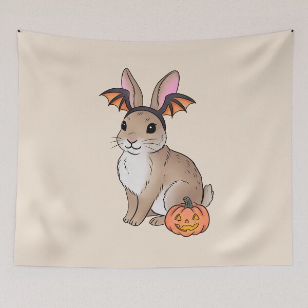 Item preview, Cottontail Rabbit in Bat Costume Sticker, Texas Wildlife Halloween Art designed and sold by Ink & Kind Studio.