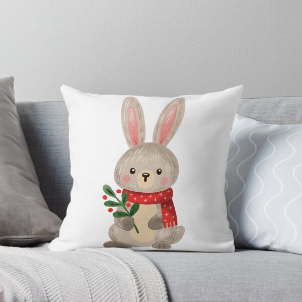 Item preview, Cartoon rabbit holding a plant while wearing a red scarf in a simple background designed and sold by Ms. Iryna.