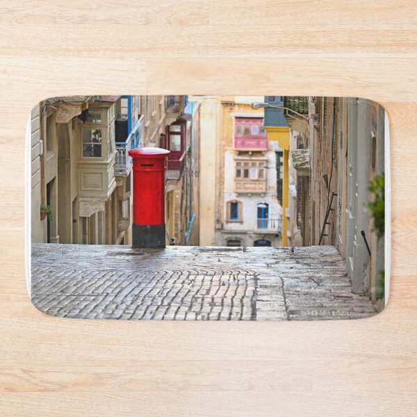 Item preview, Iconic Red British Pillar Box on a Narrow Steep Street in Valletta Malta designed and sold by goceris.
