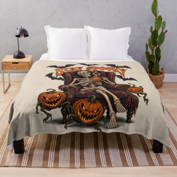 Item preview, Stay Spooky Skeleton Relaxing with Pumpkin Mug designed and sold by MythicCotton.