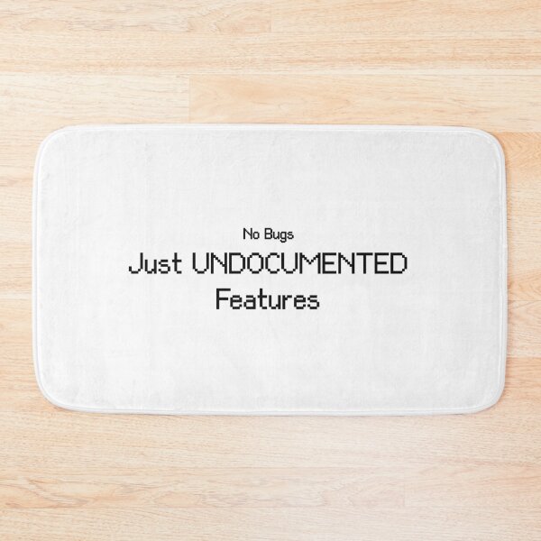 Item preview, No Bugs Just Undocumented Features Funny Programmer T-Shirt designed and sold by low battery meme design.