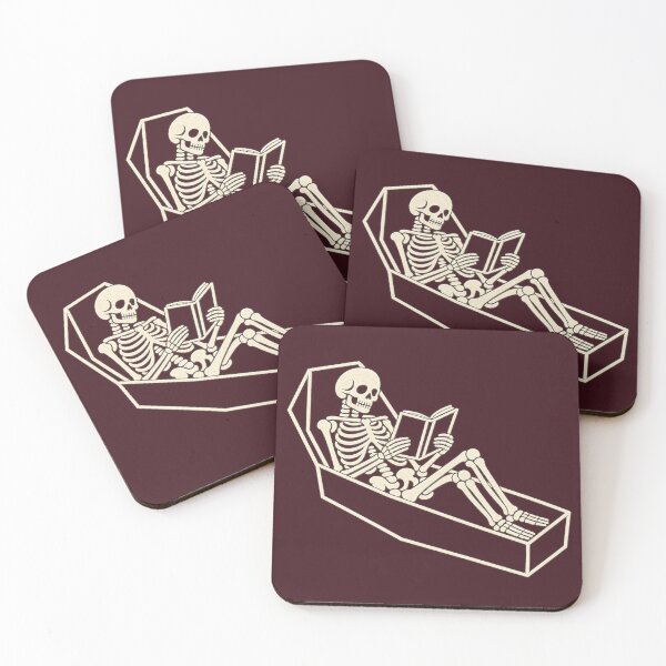 Item preview, Goth Reader Skeleton in a Coffin designed and sold by POD DYNASTY | Original Print On Demand T-Shirt Graphics.