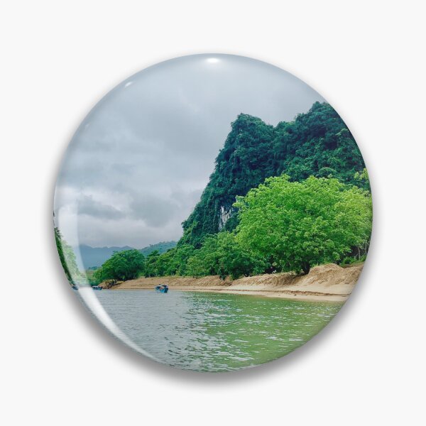 Item preview, Emerald Green River Flowing Past Karst Cliffs - Phong Nha Cave Boat Tour Scenery designed and sold by felachrata.
