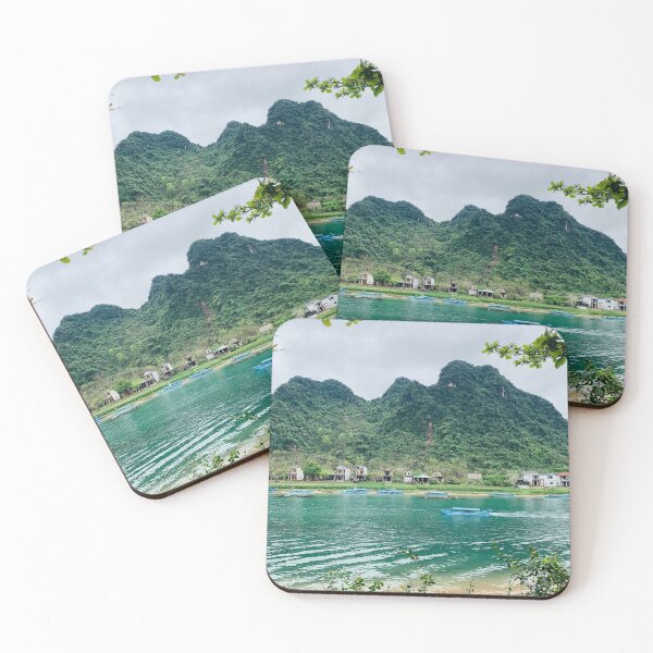 Item preview, Turquoise River Boat View With Lush Karst Mountain Backdrop designed and sold by felachrata.