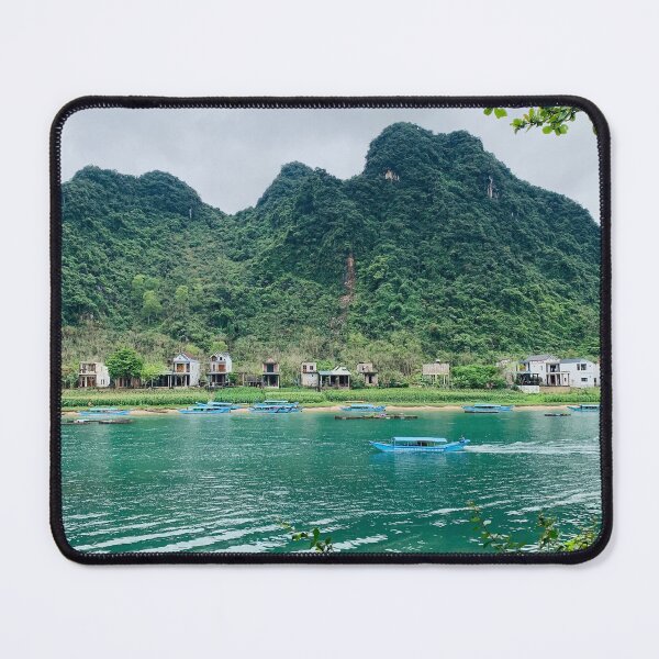 Item preview, Turquoise River Boat View With Lush Karst Mountain Backdrop designed and sold by felachrata.