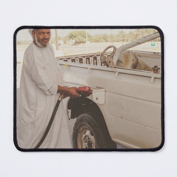 Item preview, Man in Oman filling up car at gas station designed and sold by Photopat.